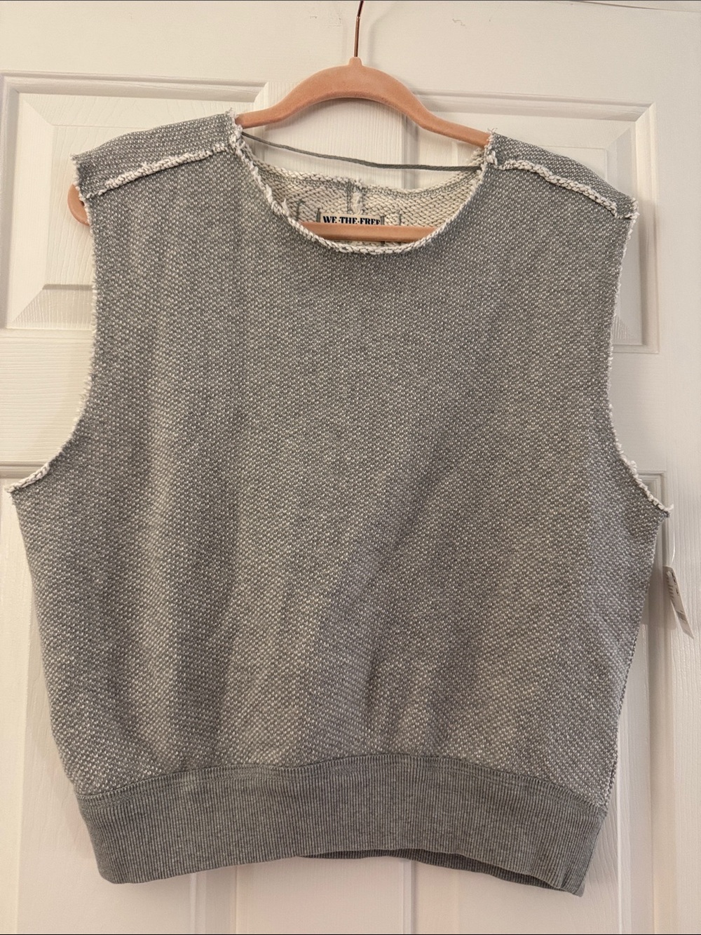 NWT Free People We The Free Raw-Edge muscle sleeveless Knit shirt